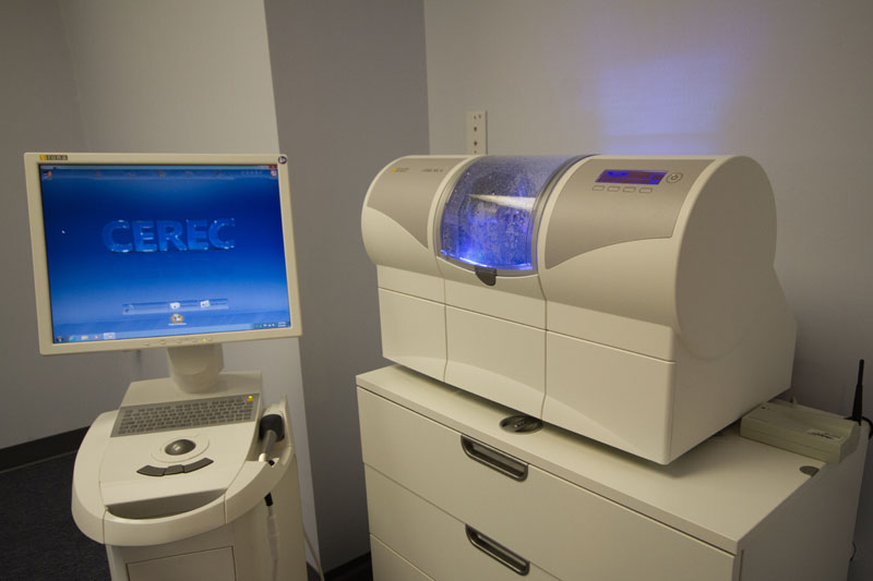 CEREC Machine, Same Day Crown advanced technology, with a monitor at Cocoa Village Dentistry